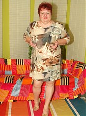 Sexy redhead BBW Louise slowly getting rid of her clothes to seduce a handsome chubby chaser